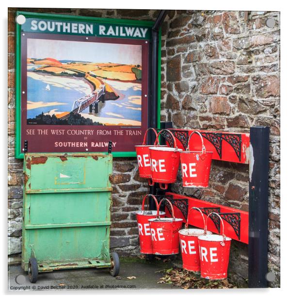 Fire bucket at Southern railway station Acrylic by David Belcher