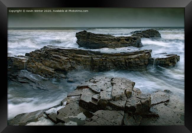 Rocks in Marsden Bay Framed Print by Kevin Winter