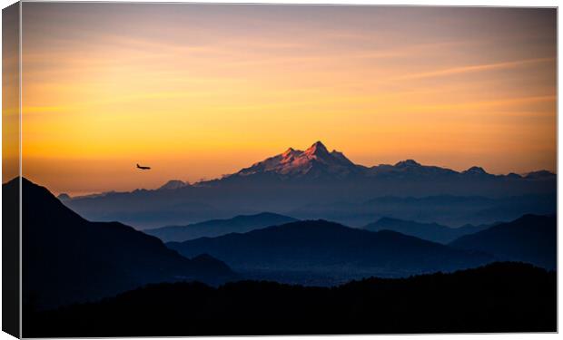 Shining Mount Manaslu range and landing airplane at Kathmandu, Nepal  Canvas Print by Ambir Tolang