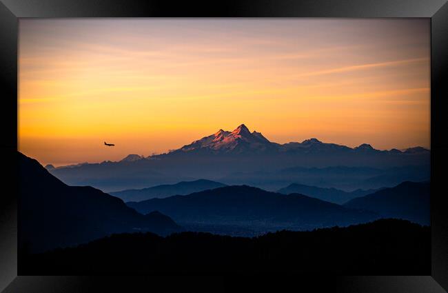 Shining Mount Manaslu range and landing airplane at Kathmandu, Nepal  Framed Print by Ambir Tolang