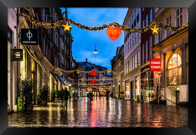 Christmas shopping street at night in Copenhagen Framed Print by Stig Alenäs