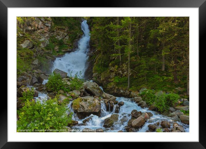 a deafening waterfall falling from glaciers  Framed Mounted Print by susanna mattioda