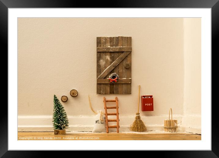 Doll house door for Santa Claus Framed Mounted Print by Stig Alenäs