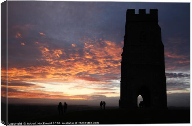 Sunset behind St Michael's Tower on Glastonbury Tor Canvas Print by Robert MacDowall
