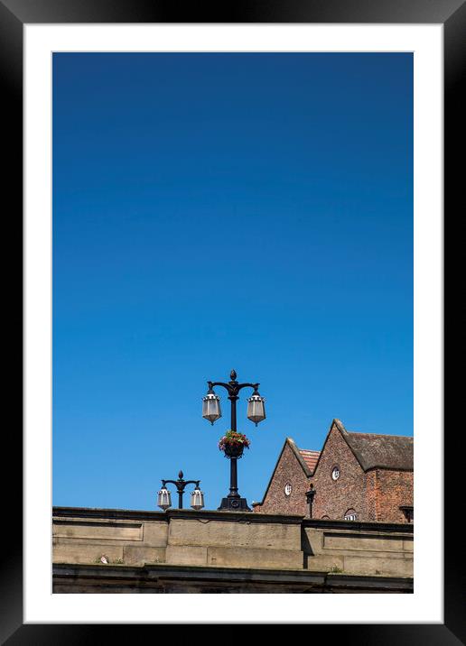 Street lamps against blue sky, York, Yorkshire,  Framed Mounted Print by Phil Crean