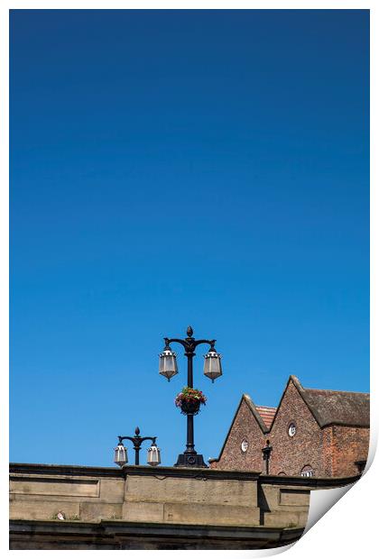 Street lamps against blue sky, York, Yorkshire,  Print by Phil Crean
