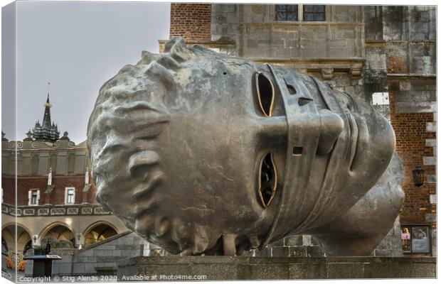 Bronze head in the main square, old town Krakow Canvas Print by Stig Alenäs