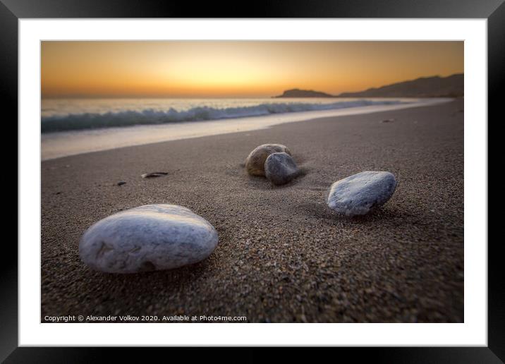 Sea-washed pebbles on a quiet sandy Mediterranean  Framed Mounted Print by Alexander Volkov