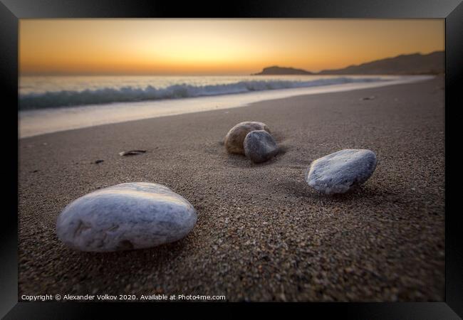 Sea-washed pebbles on a quiet sandy Mediterranean  Framed Print by Alexander Volkov