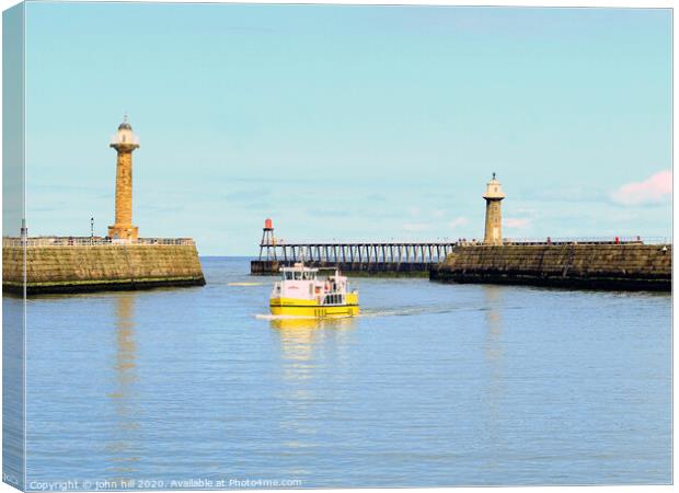 The Twin Piers at Whitby in Yorkshire. Canvas Print by john hill
