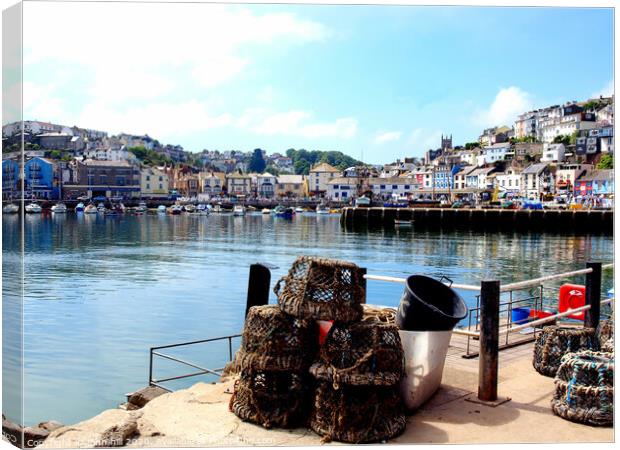 A tranquil  morning harbour at Brixham in Devon. Canvas Print by john hill