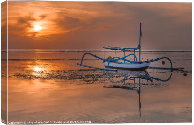 An old traditional indonesian fishing boat at sunrise Canvas Print by Stig Alenäs
