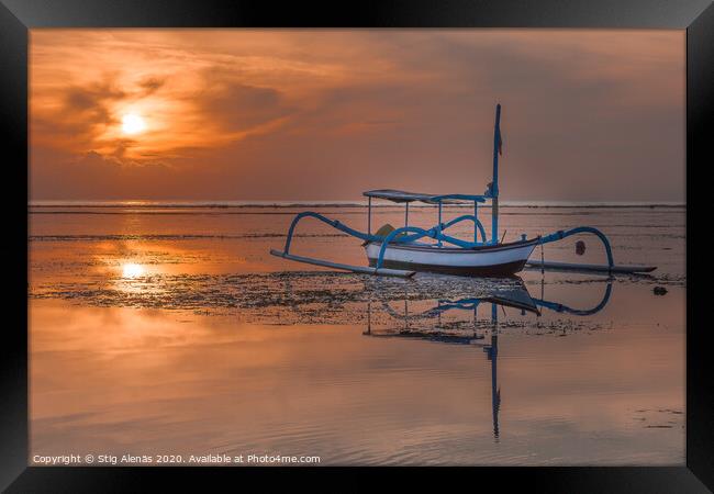 An old traditional indonesian fishing boat at sunrise Framed Print by Stig Alenäs