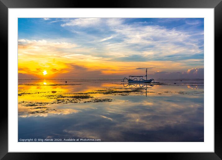 An old traditional indonesian fishing boat at sunrise Framed Mounted Print by Stig Alenäs