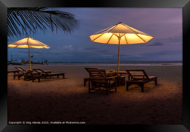 Umbrellas and sunbeds on the beach at night Framed Print by Stig Alenäs