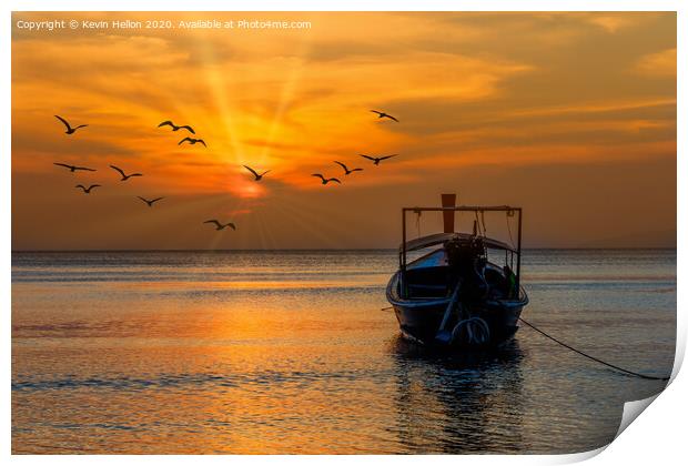 Boat facing the sunset in Pak Meng Print by Kevin Hellon