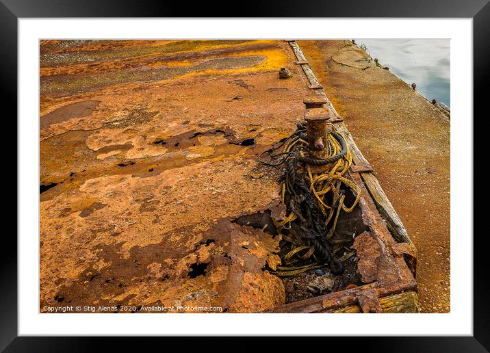 two very rusty bollards at the quay Framed Mounted Print by Stig Alenäs