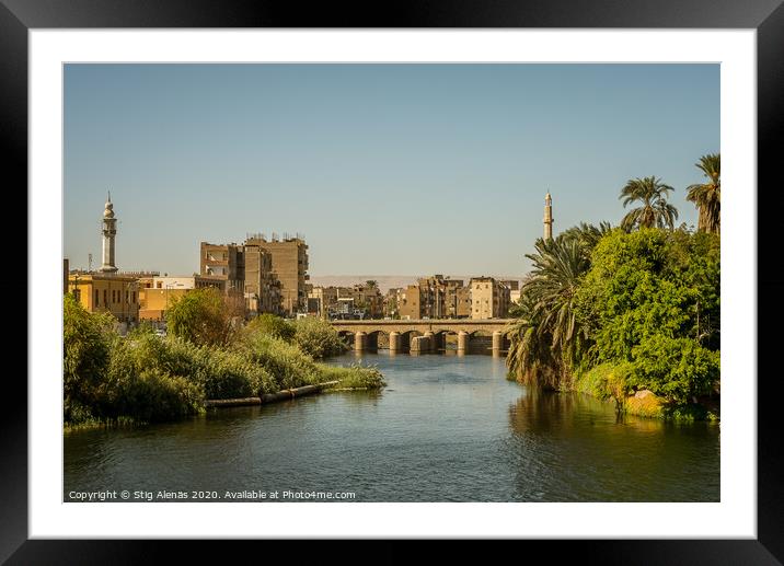 Egyptian town in the sunset , a view from a cruise on the Nile Framed Mounted Print by Stig Alenäs