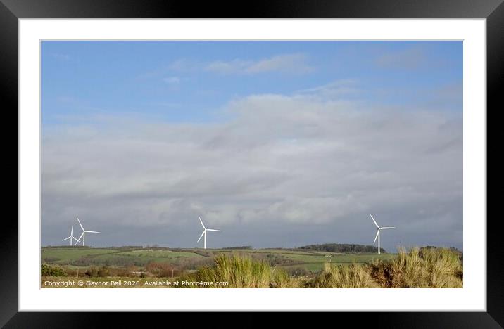 The windmills at Stormy as seen from Porthcawl  Framed Mounted Print by Gaynor Ball