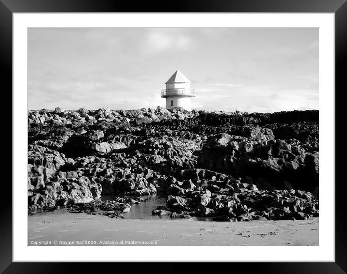 The disused lighthouse at Coney Beach Porthcawl  Framed Mounted Print by Gaynor Ball