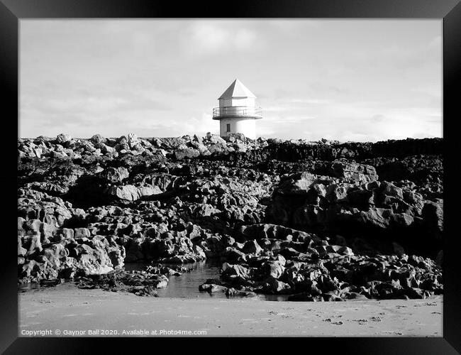 The disused lighthouse at Coney Beach Porthcawl  Framed Print by Gaynor Ball