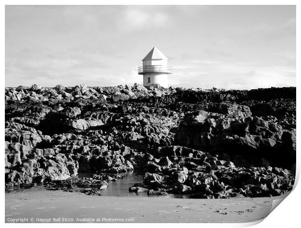 The disused lighthouse at Coney Beach Porthcawl  Print by Gaynor Ball