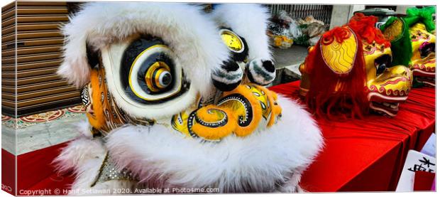 White Chinese Dragon mask on a festival for CNY Canvas Print by Hanif Setiawan