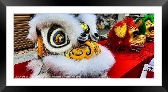White Chinese Dragon mask on a festival for CNY Framed Mounted Print by Hanif Setiawan