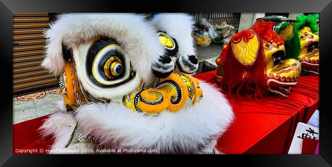 White Chinese Dragon mask on a festival for CNY Framed Print by Hanif Setiawan