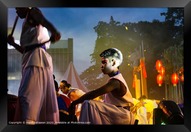 Young drummer performer on a culture festival. Framed Print by Hanif Setiawan