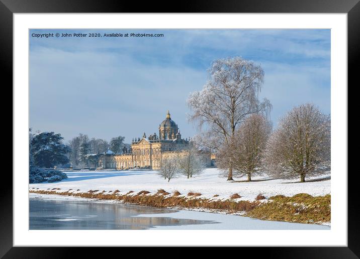 Castle Howard and South Lake in mid-winter. Framed Mounted Print by John Potter