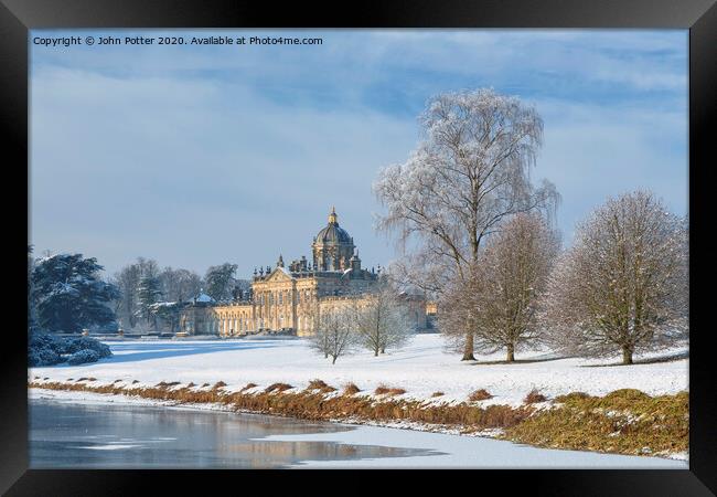 Castle Howard and South Lake in mid-winter. Framed Print by John Potter
