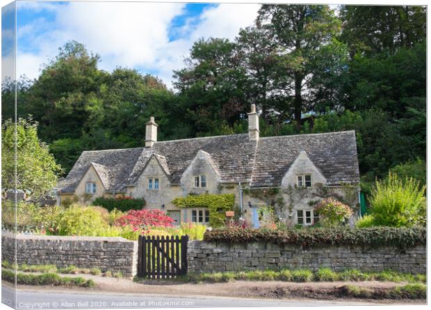 Cottages on road through Bibury Canvas Print by Allan Bell