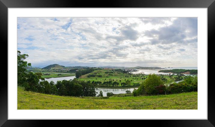 green coastline at sea with golf course and cloudy sky Framed Mounted Print by David Galindo