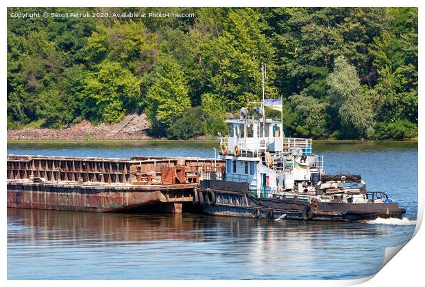 An old river tug pushes an empty barge ahead of itself along the river bank. Print by Sergii Petruk