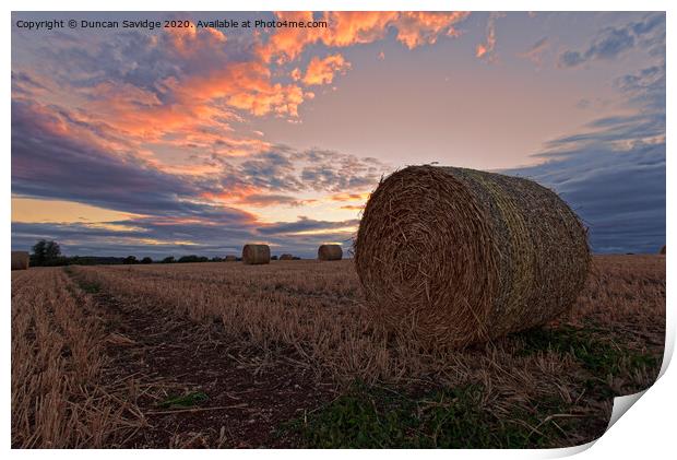 Harvest / hay bale sunset Print by Duncan Savidge