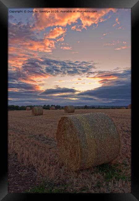 Harvest / hay bale sunset portrait  Framed Print by Duncan Savidge