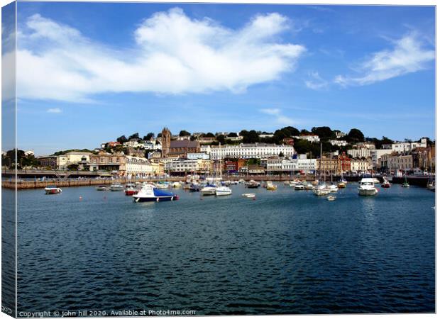 The Inner harbour and town at Torquay in Devon. Canvas Print by john hill