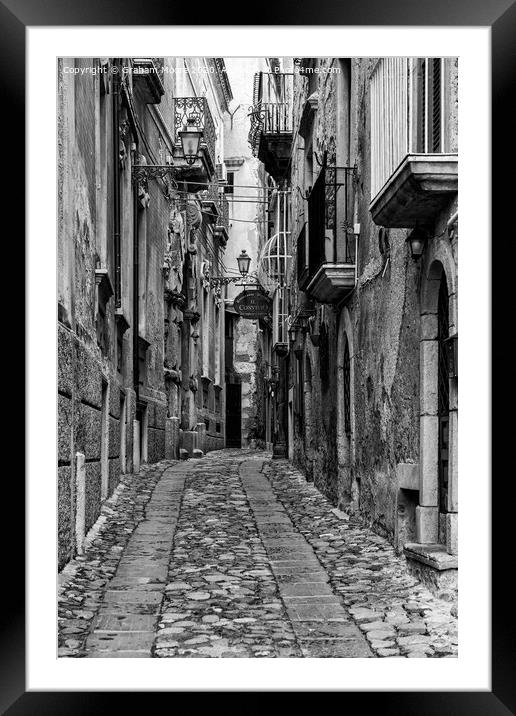 Tropea street monochrome Framed Mounted Print by Graham Moore