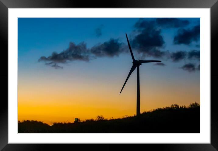 Wind turbine at sunset Framed Mounted Print by Brenda Belcher