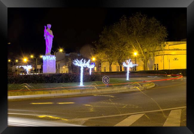 Lights in the evening near a sculpture Framed Print by Jose Manuel Espigares Garc