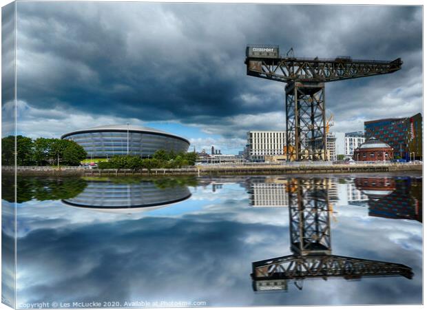 Towering Reflections Canvas Print by Les McLuckie