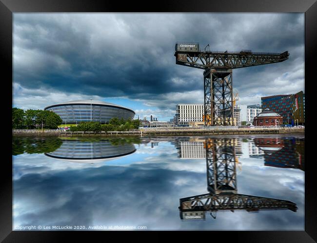 Towering Reflections Framed Print by Les McLuckie