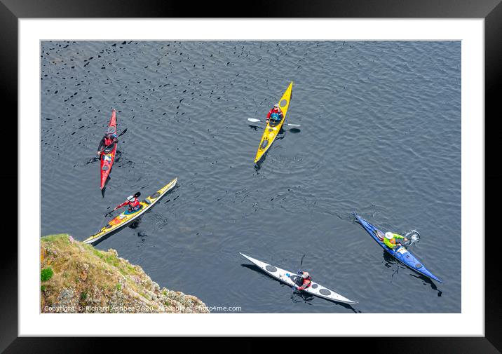 Colurful Kayaks below Westwick cliffs in Shetland Framed Mounted Print by Richard Ashbee