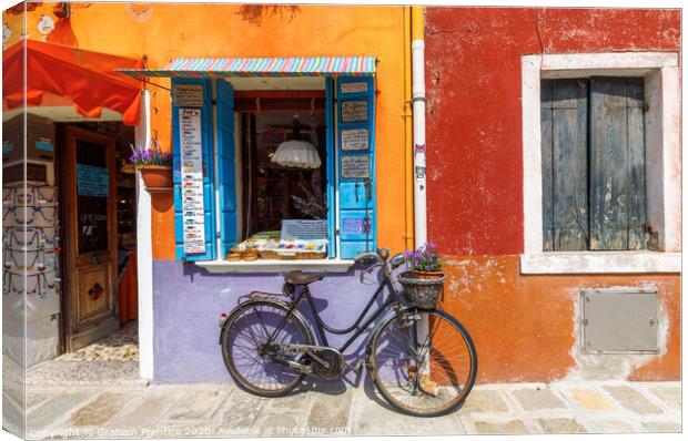 Bicycle Outside Burano Shop Canvas Print by Graham Prentice