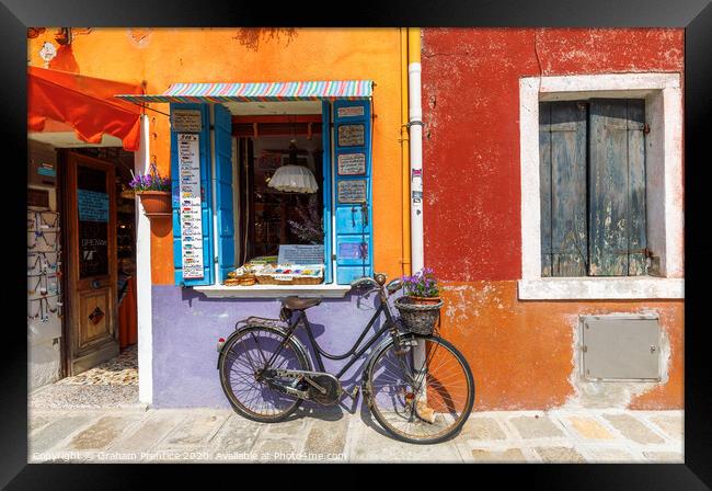 Bicycle Outside Burano Shop Framed Print by Graham Prentice