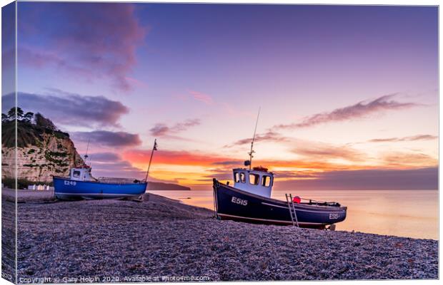 Dawn over fishing boats on Beer Beach Canvas Print by Gary Holpin