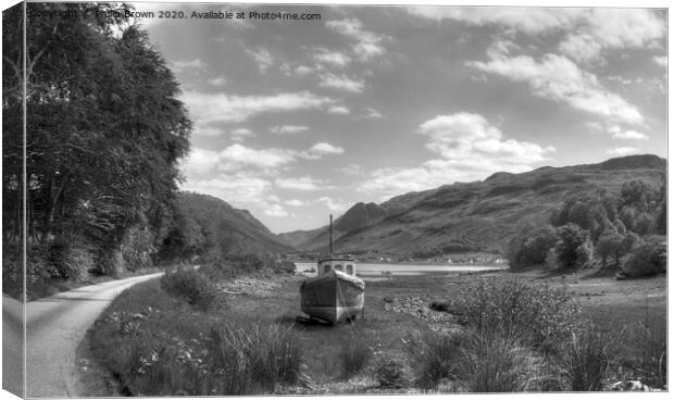 Boat near mountain road and lake in Scotland Canvas Print by Philip Brown