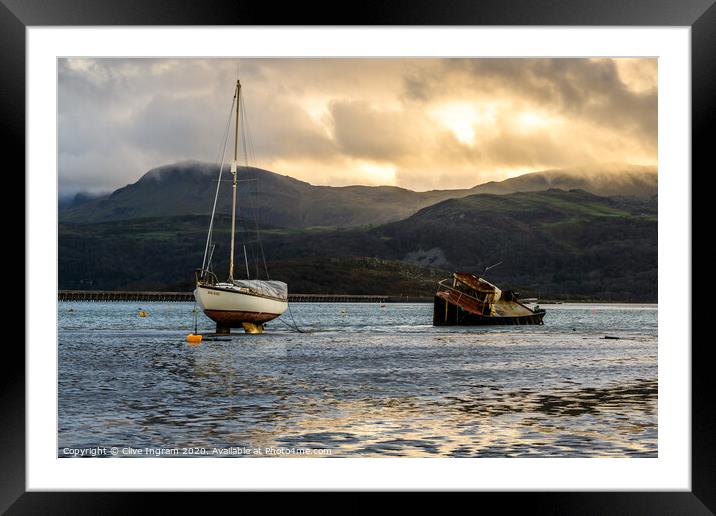 Boats at low tide under a winter's sun Framed Mounted Print by Clive Ingram
