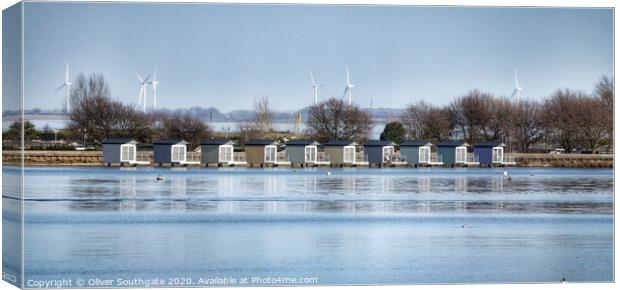 Osea Beach Huts Canvas Print by Oliver Southgate